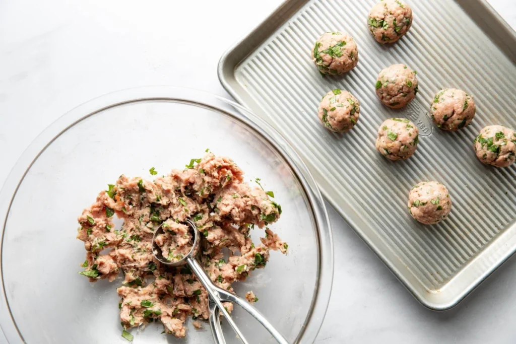 Yellow Curry Meatballs with Peanut Shallot Crispies: A Weeknight Culinary Triumph